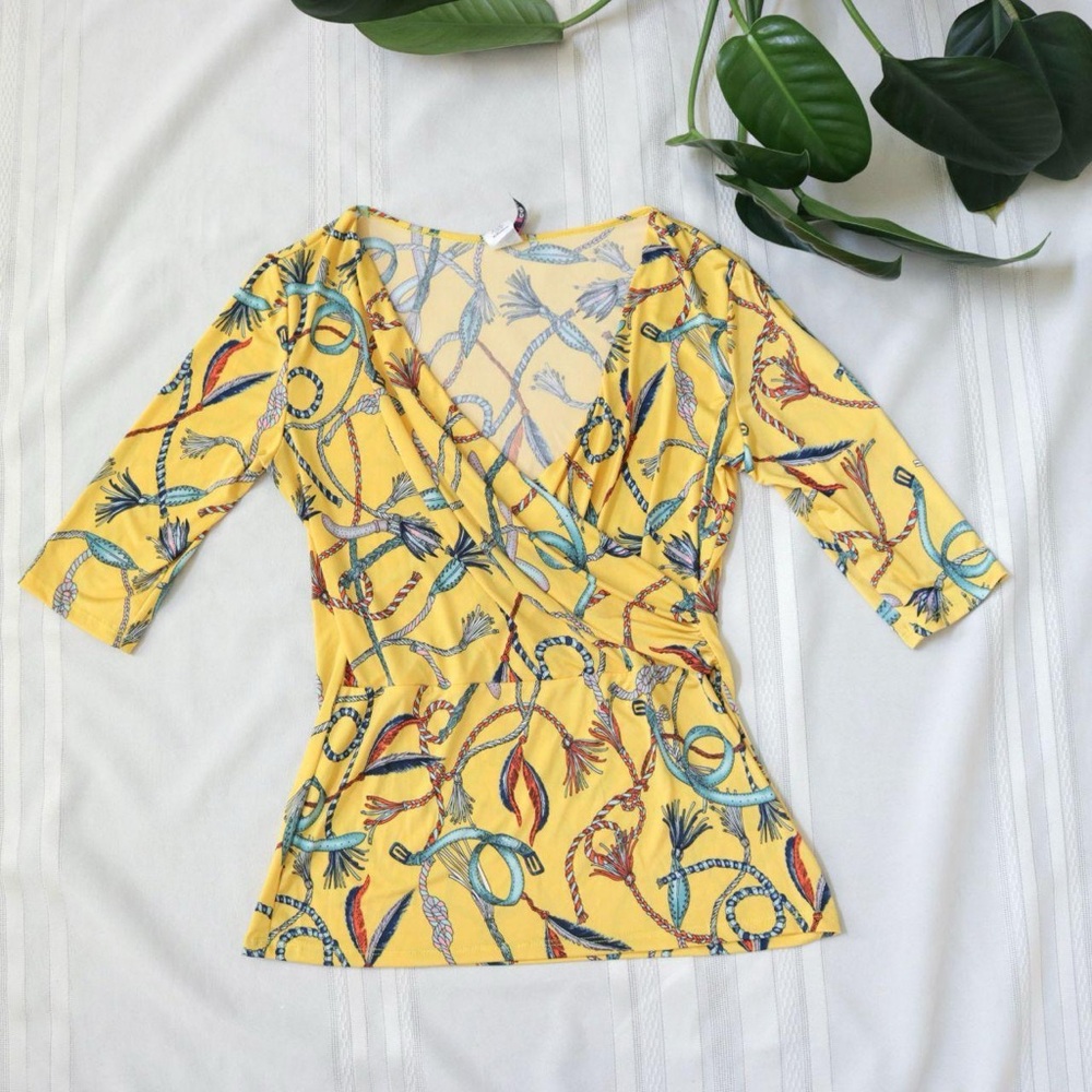 Lassos and Tassles patterned yellow wrap style blouse